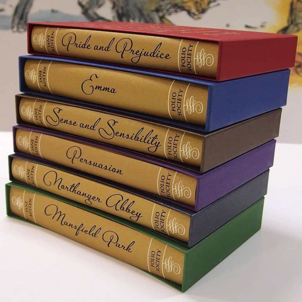 Photo of Jane Austen's seven novels stacked on top of each other with spines facing out.